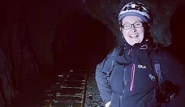 A family exploring historic slate caverns in Snowdonia North Wales